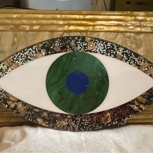 Evil eye clutch